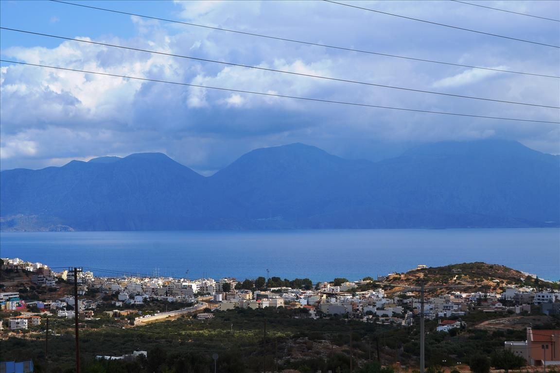 Земля в Ласити, Греция, 9 800 м2 - фото 1