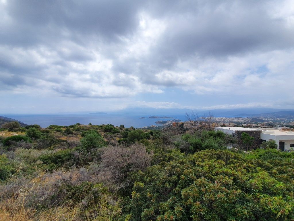 Земля в Ласити, Греция, 2 000 м2 - фото 1