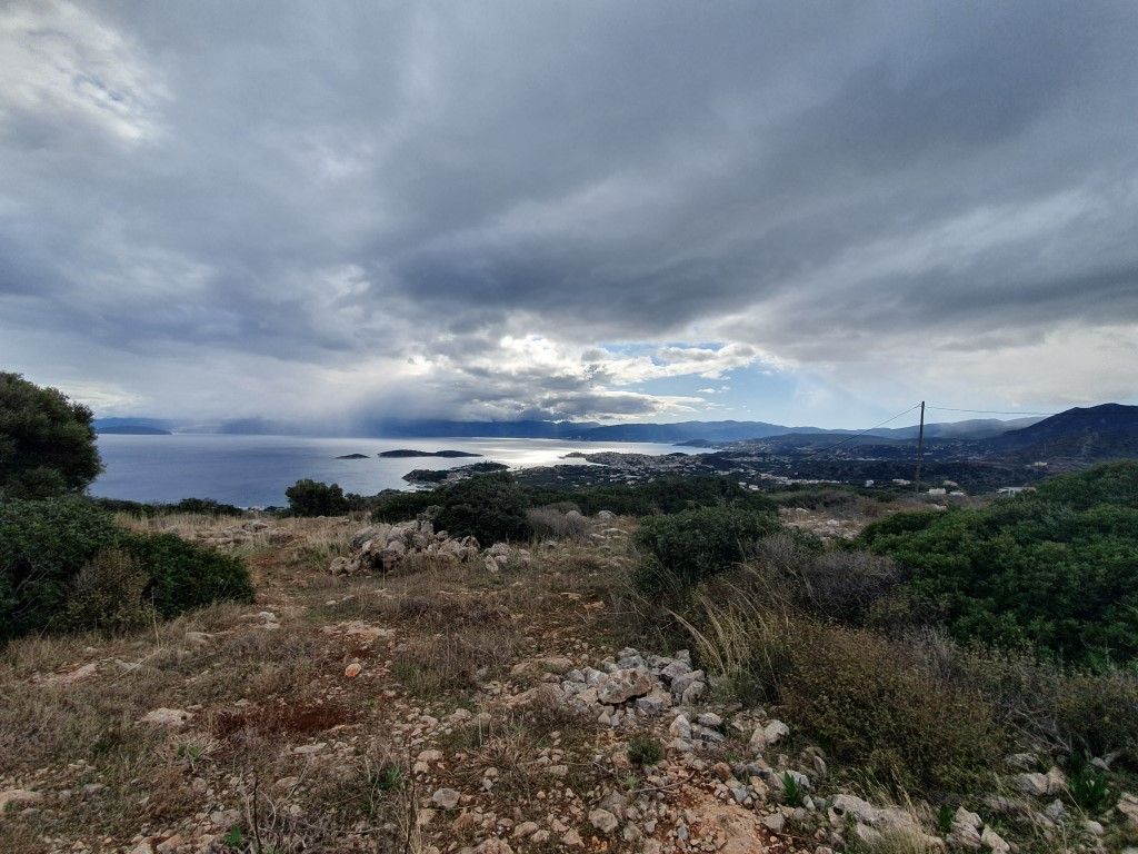 Земля в Ласити, Греция, 3 000 м2 - фото 1