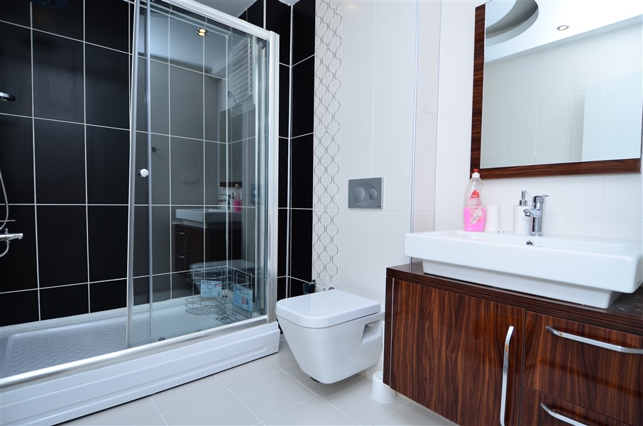 Апартаменты в Алании, Турция, 65 м² - фото 15