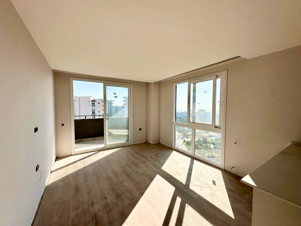 Квартира в Мерсине, Турция, 90 м² - фото 1