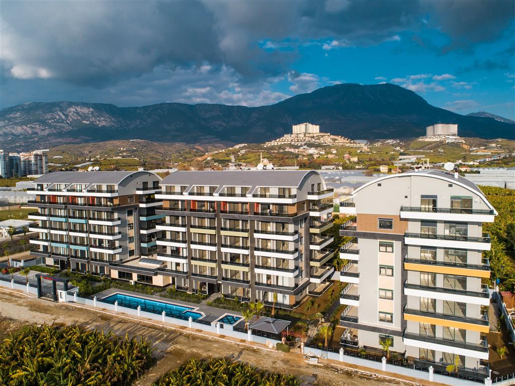 Апартаменты в Алании, Турция, 65 м² - фото 10