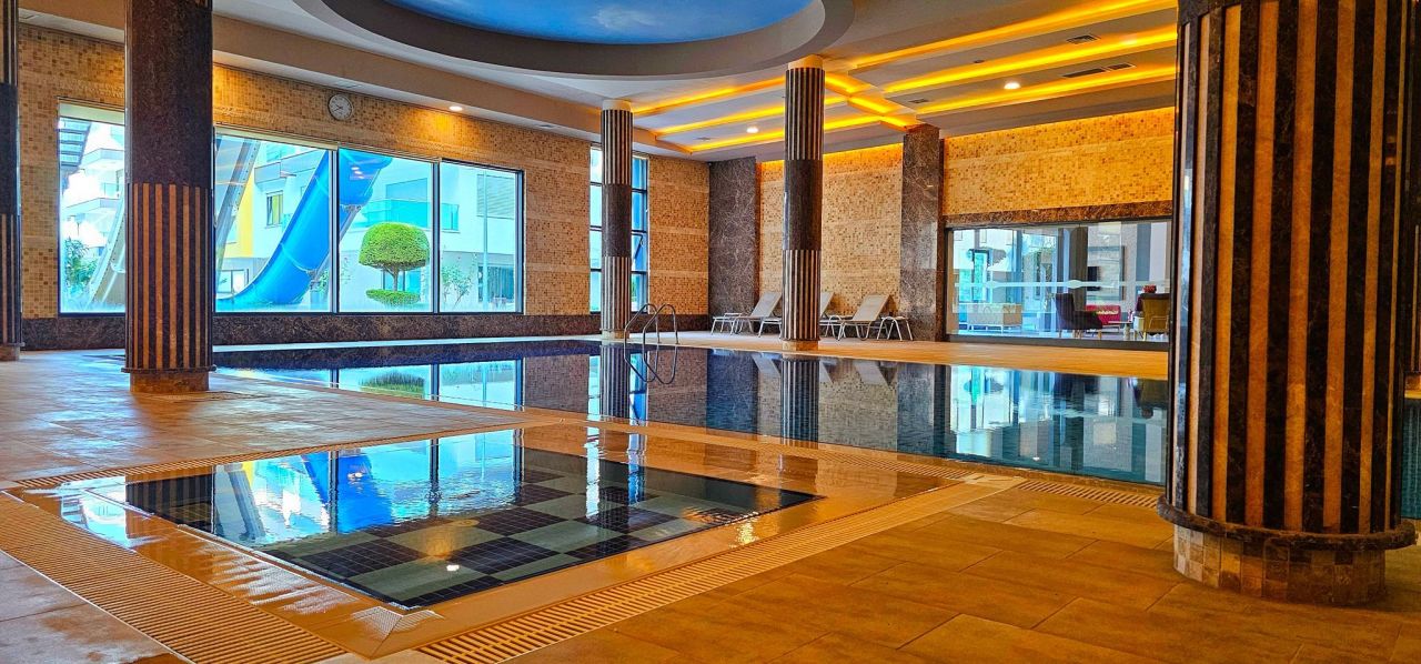 Апартаменты в Алании, Турция, 65 м² - фото 12