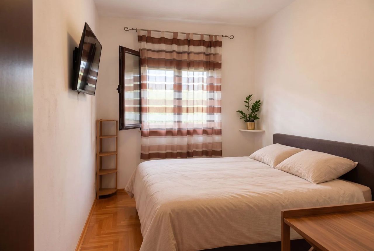 Квартира с 1 спальней 42 м², новый дом, вид на зелёный парк — Будва 5
