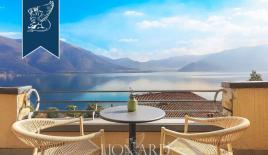 Вилла за 1 600 000 евро в Карате-Урио, Италия