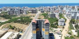 Современная квартира 1+1 в Махмутларе - Фото